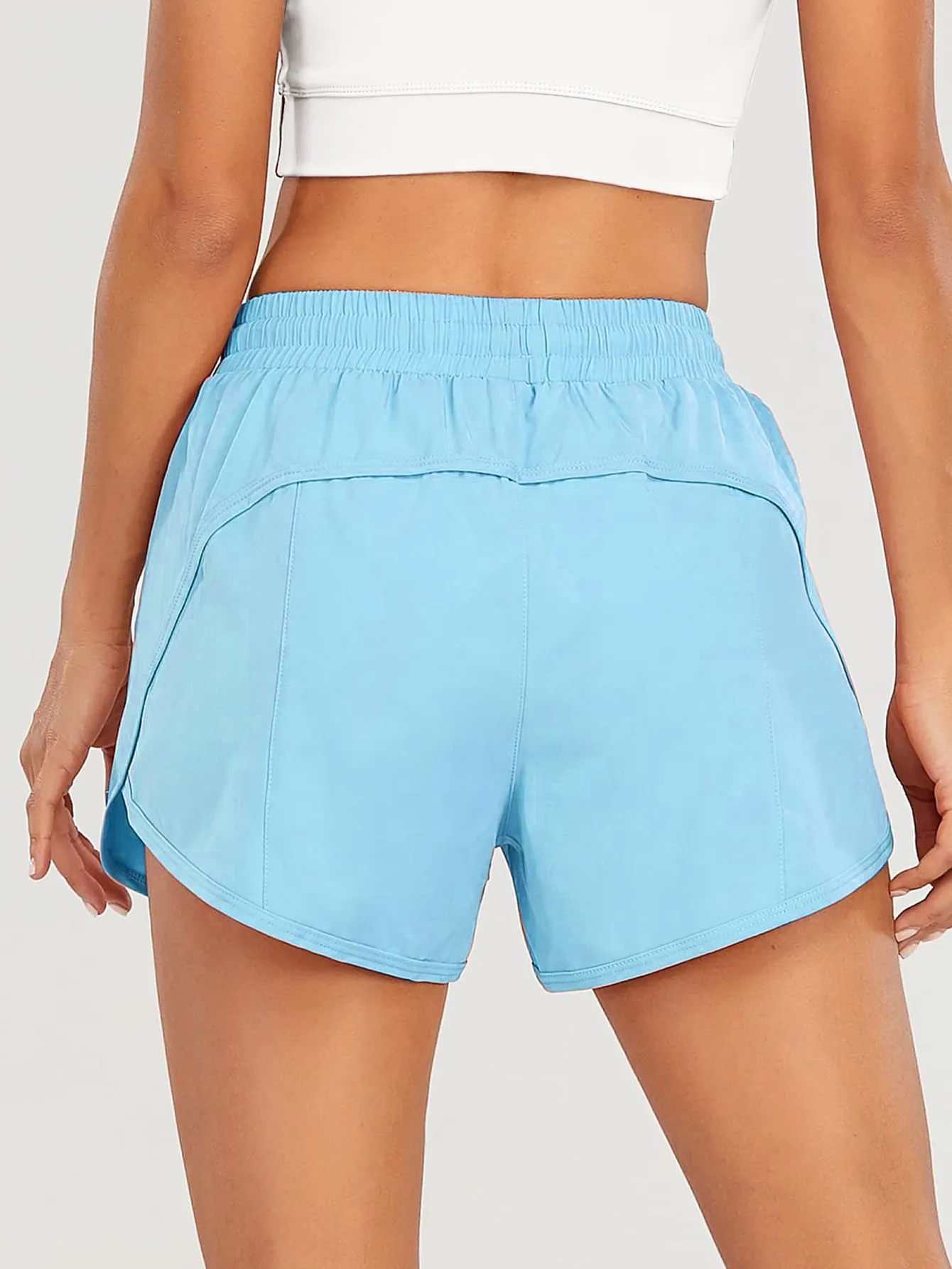 Drawstring Waist Zipper Pocket Lined Running Shorts